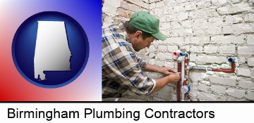 a plumbing contractor installing new water supply lines in Birmingham, AL