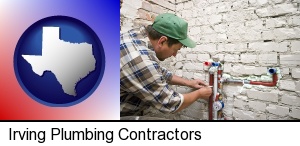 Irving, Texas - a plumbing contractor installing new water supply lines