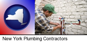 New York, New York - a plumbing contractor installing new water supply lines