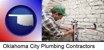 a plumbing contractor installing new water supply lines in Oklahoma City, OK