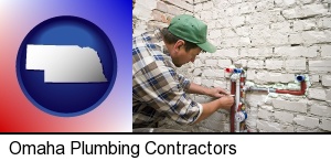a plumbing contractor installing new water supply lines in Omaha, NE