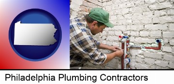 a plumbing contractor installing new water supply lines in Philadelphia, PA