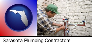 Sarasota, Florida - a plumbing contractor installing new water supply lines