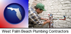 a plumbing contractor installing new water supply lines in West Palm Beach, FL