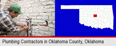 a plumbing contractor installing new water supply lines; Oklahoma County highlighted in red on a map